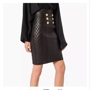 Kultivate knee-length black leather skirt with quilted pattern. NWT.Size large.